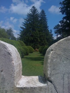 Formal gardens at Tanglewood through the monument