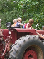 kids flying a tractor